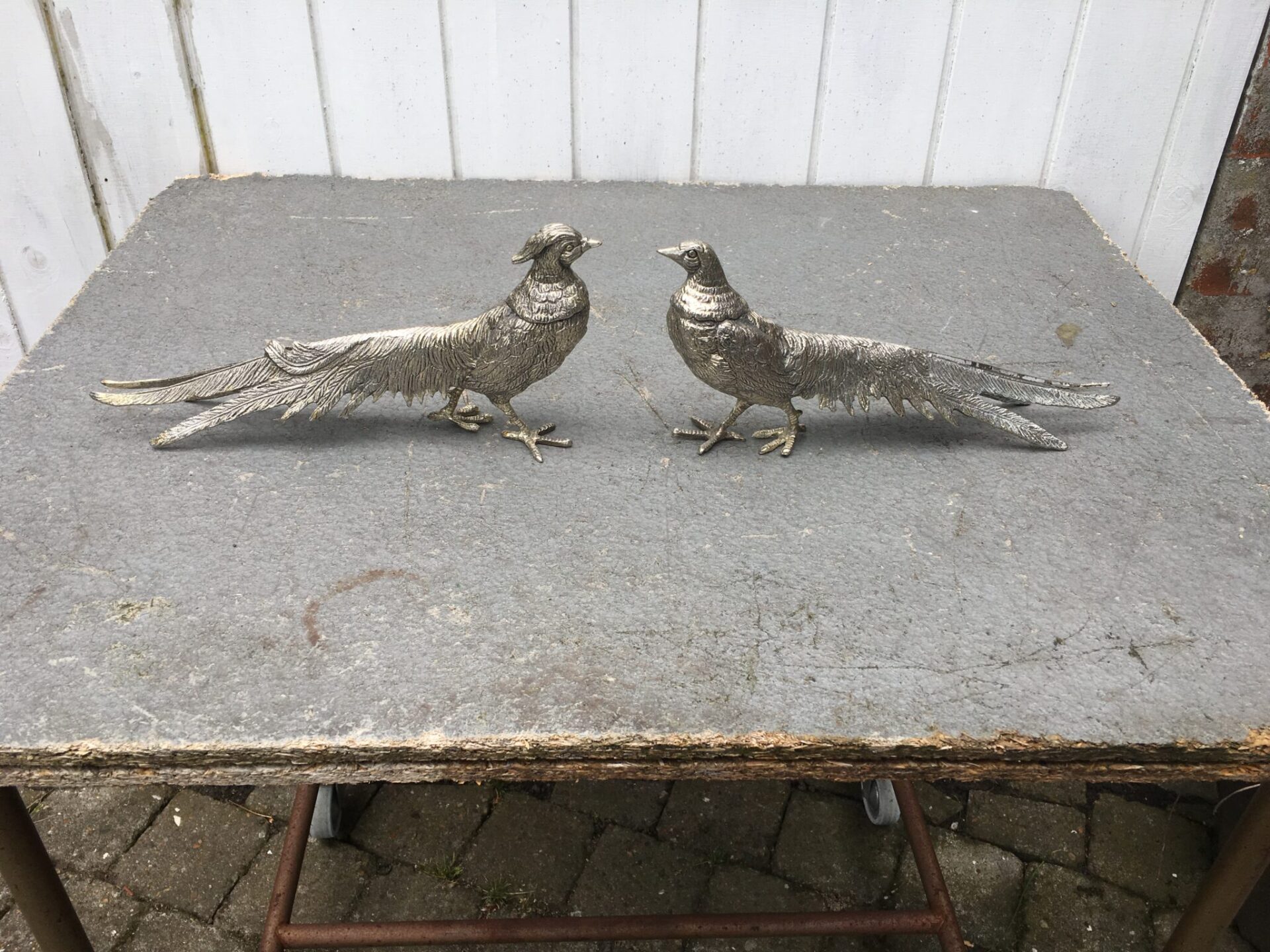 2 stk fasaner af pletsølv, l=31cm, samlet pris 500 kr